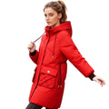 Side view of Les Odettes women's long puffer jacket, stylish and warm women's puffer parka coat with a quilted design.