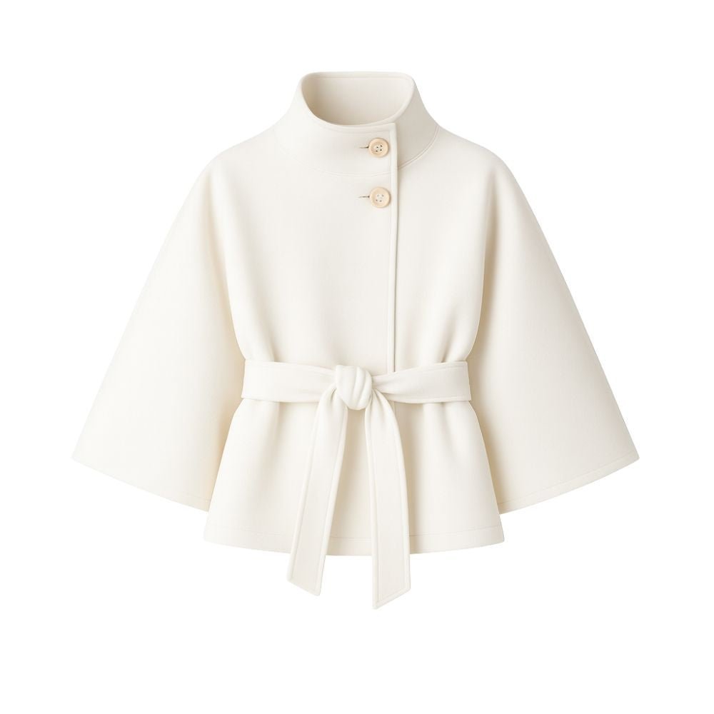 Women's sculptural wool blend belted cape jacket by Les Odettes, shown from the front in white with a draped design.
