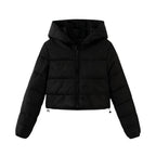 Les Odettes women's black cropped puffer jacket with lightweight insulation and nylon fabric, front view.