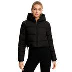 Women’s black lightweight cropped puffer jacket by Les Odettes, showcasing its insulated nylon material and fitted design.