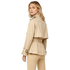 Beige cropped cotton gabardine jacket with belted waist, lightweight outerwear by Les Odettes, shown from the back.