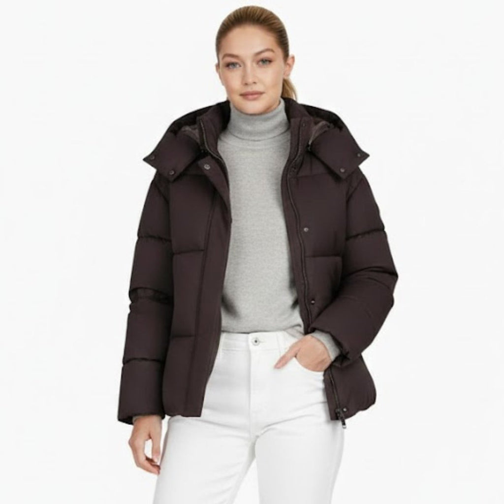 Women’s espresso brown puffer jacket by Les Odettes, front view showcasing quilted design and short length for women’s jackets.