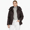 Women’s espresso brown puffer jacket by Les Odettes, front view showcasing quilted design and short length for women’s jackets.