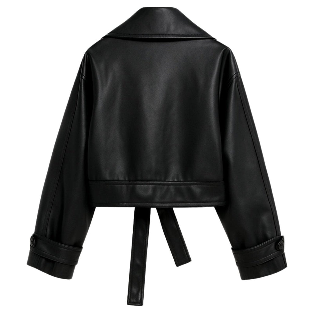 Black women's vegan leather moto jacket by Les Odettes, shown from the back with stylish stitched design and classic moto silhouette.