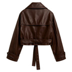 Dark brown women's vegan leather moto jacket by Les Odettes, shown from the back with cropped design and classic moto style.