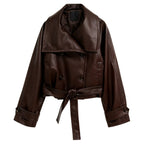 Women’s dark brown vegan leather moto jacket by Les Odettes, cropped front view showing classic moto style and textured leather finish.