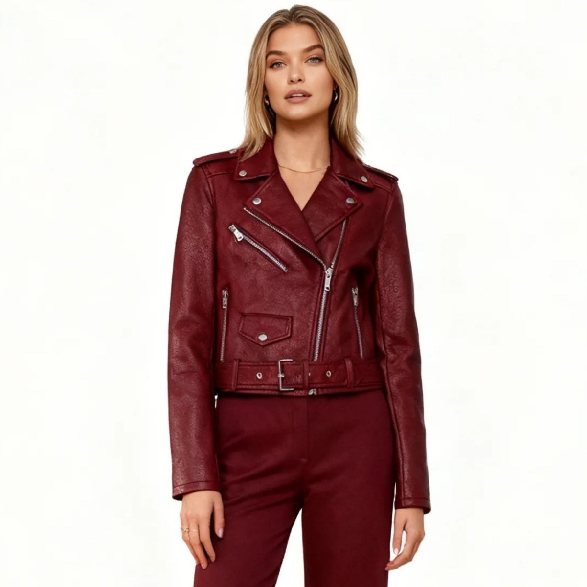 Front view of a woman wearing Les Odettes burgundy vegan leather moto jacket with classic collar and zip details.