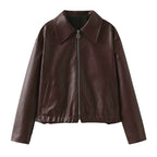 Women’s burgundy vegan leather jacket by Les Odettes, front view showcasing sleek bomber style and smooth faux leather finish.