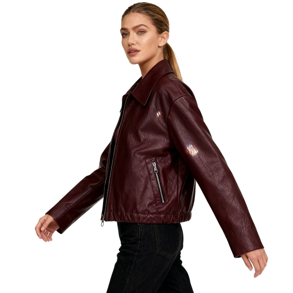 Women’s burgundy vegan leather jacket by Les Odettes, featuring a stylish bomber design and side view detail.