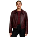 Women's vegan leather jacket by Les Odettes, burgundy faux leather bomber jacket with a stylish fit and classic design.
