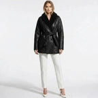 Front view of Les Odettes women's shearling jacket with belted faux shearling aviator style, showcasing cozy collar and front pockets.