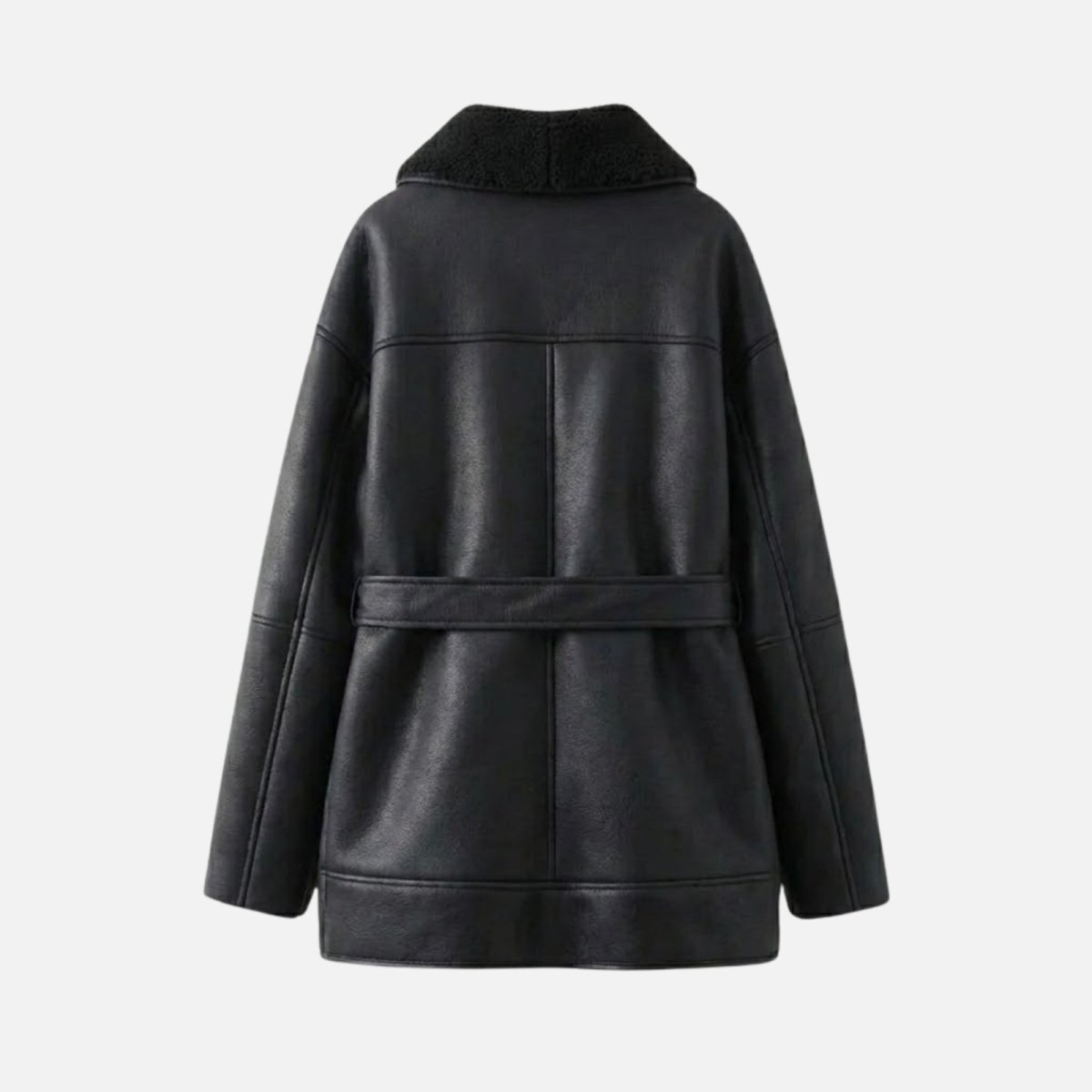 Black women's shearling jacket by Les Odettes, shown flat with back view, featuring cozy shearling trim and stylish design.