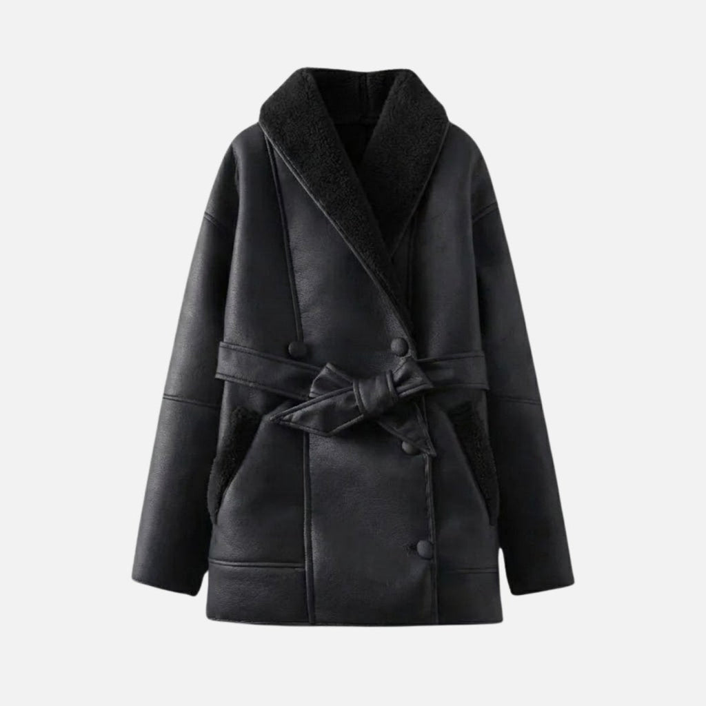 Black women’s shearling jacket from Les Odettes, shown flat with front view, featuring soft shearling lining and stylish collar.