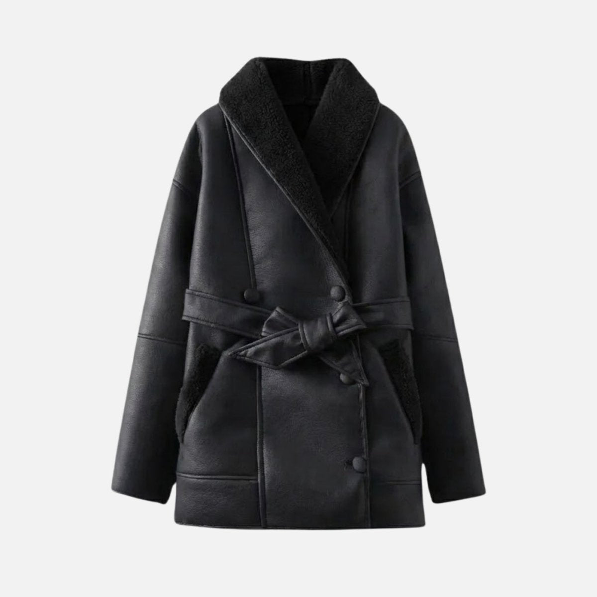Black women’s shearling jacket from Les Odettes, shown flat with front view, featuring soft shearling lining and stylish collar.