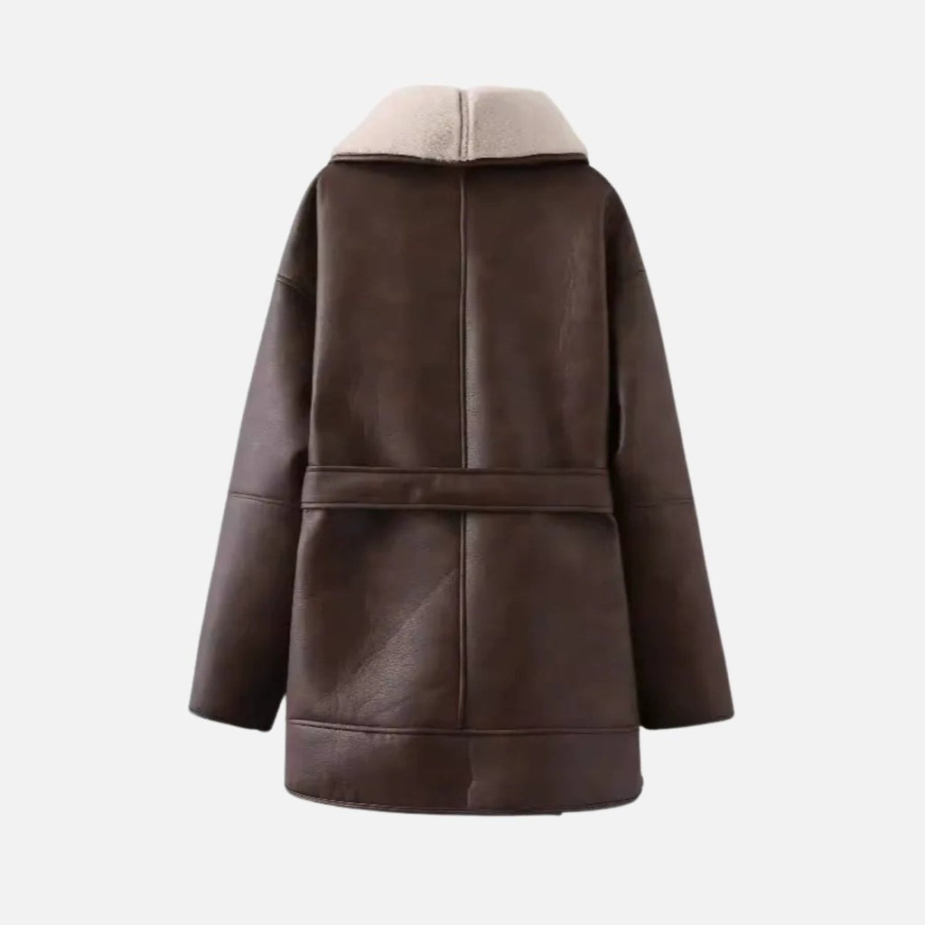 Women’s faux shearling jacket by Les Odettes displayed flat with back view, showcasing soft, plush fabric and stylish design.