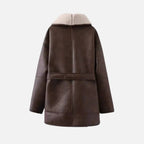 Women’s faux shearling jacket by Les Odettes displayed flat with back view, showcasing soft, plush fabric and stylish design.