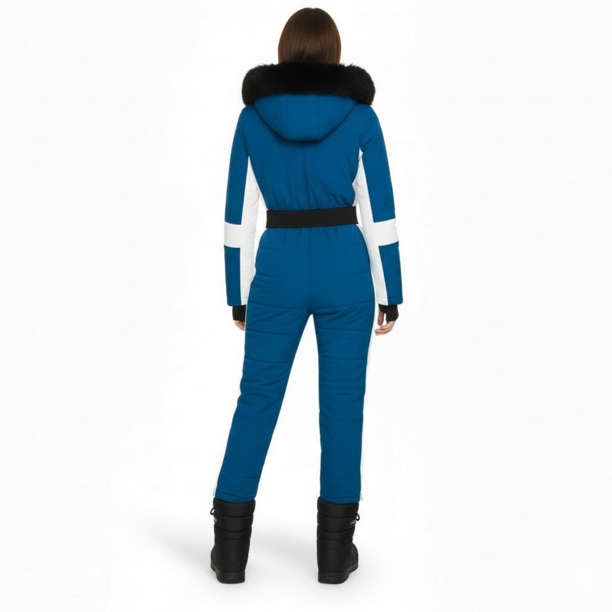 Les Odettes Dolly Glamour Ski Suit for women in blue, featuring a belted back and stylish outerwear for snow sports.