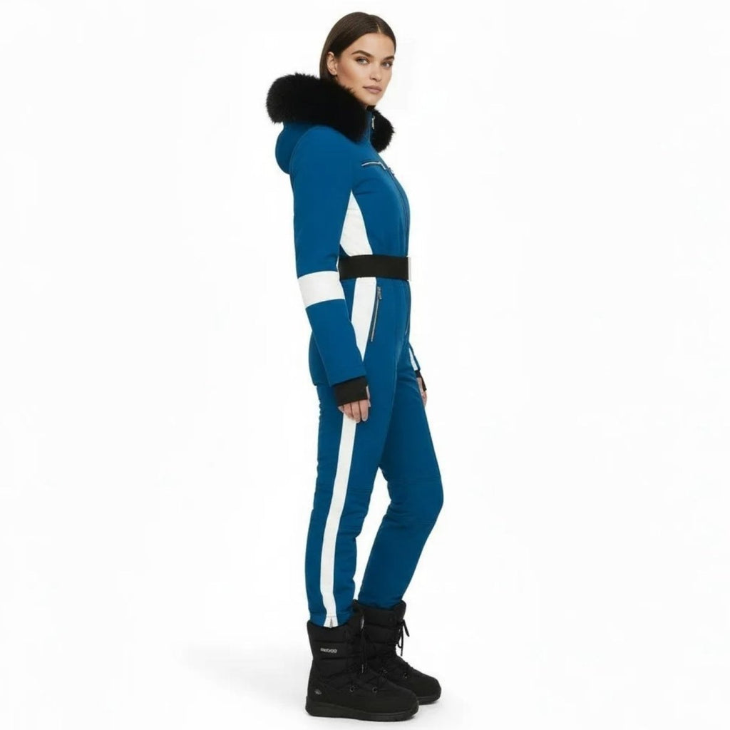 Blue Les Odettes Glamour Ski Suit Monosuit with white stripe sides, designed for women’s winter snowboarding and skiing activities.