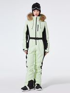 Women's Arctic Queen slim fit windproof one-piece ski suit by Les Odettes, featuring insulated design and full-length zipper.