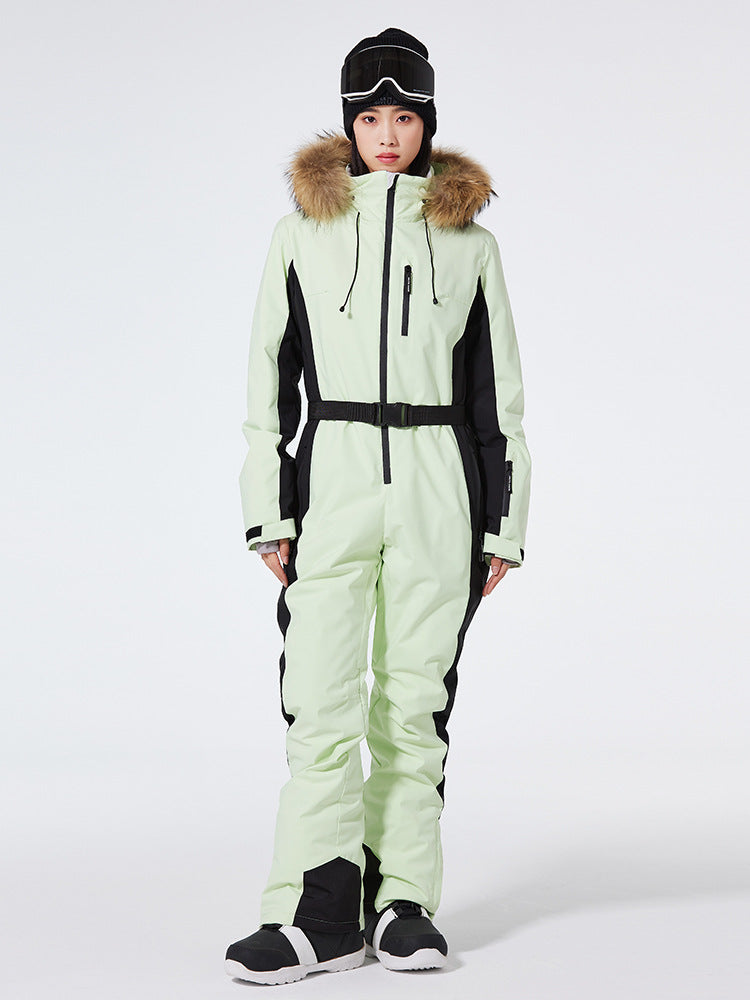 Women's Arctic Queen slim fit windproof one-piece ski suit by Les Odettes, featuring insulated design and full-length zipper.