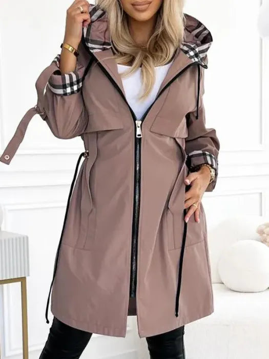 Becca™ waterproof and windproof zip coat by Les Odettes, shown in a sleek, weather-resistant design with a front zipper and hood.
