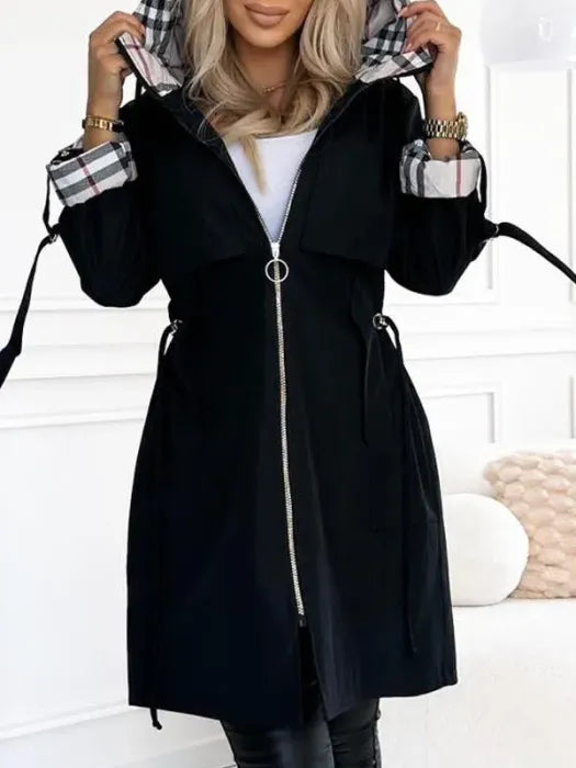 Becca™ waterproof and windproof zip coat by Les Odettes, shown in a sleek black design with a full front zipper and hood.