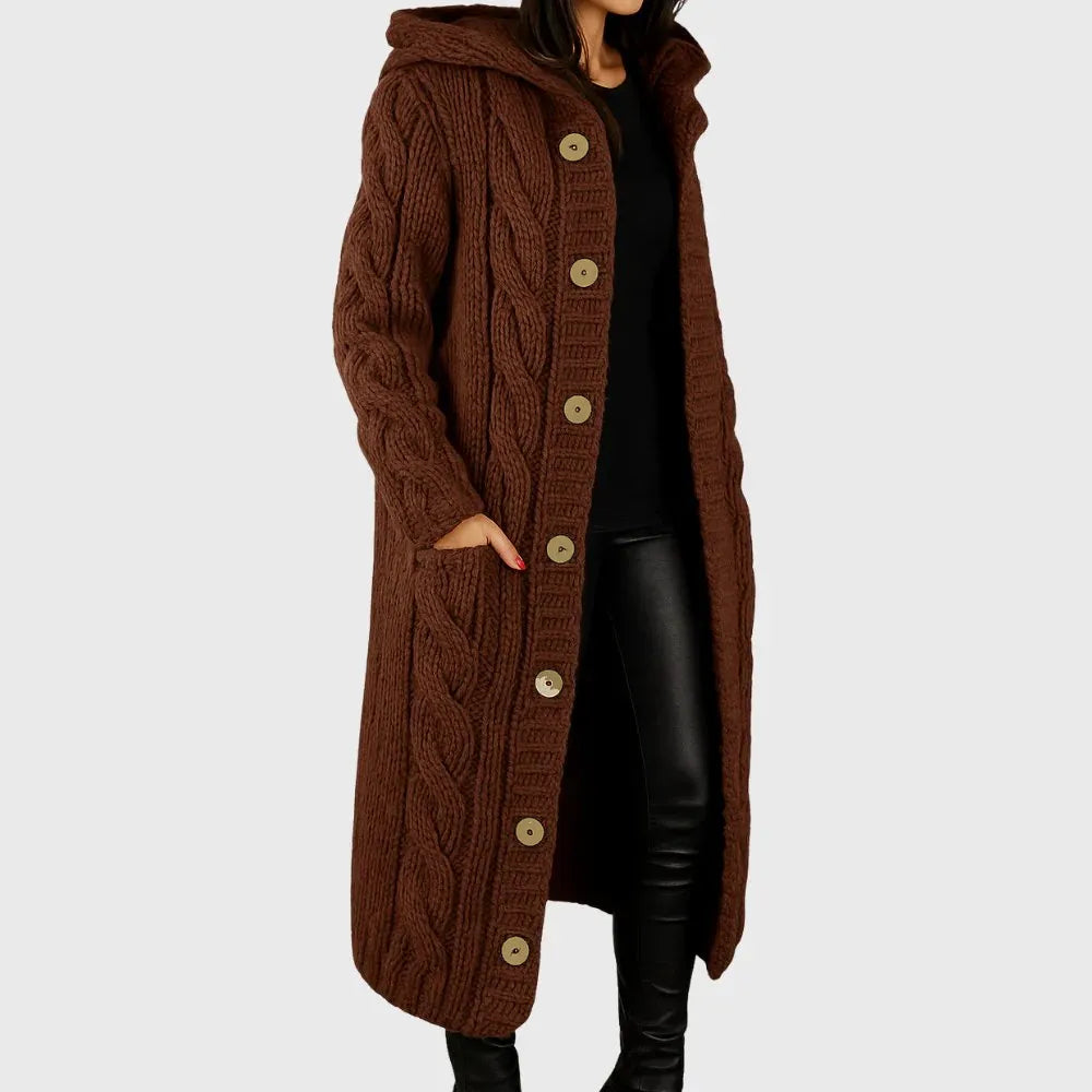Elegant Les Odettes Cadence™ cozy coat with a soft, textured fabric, detailed collar, and stylish design perfect for cold weather.