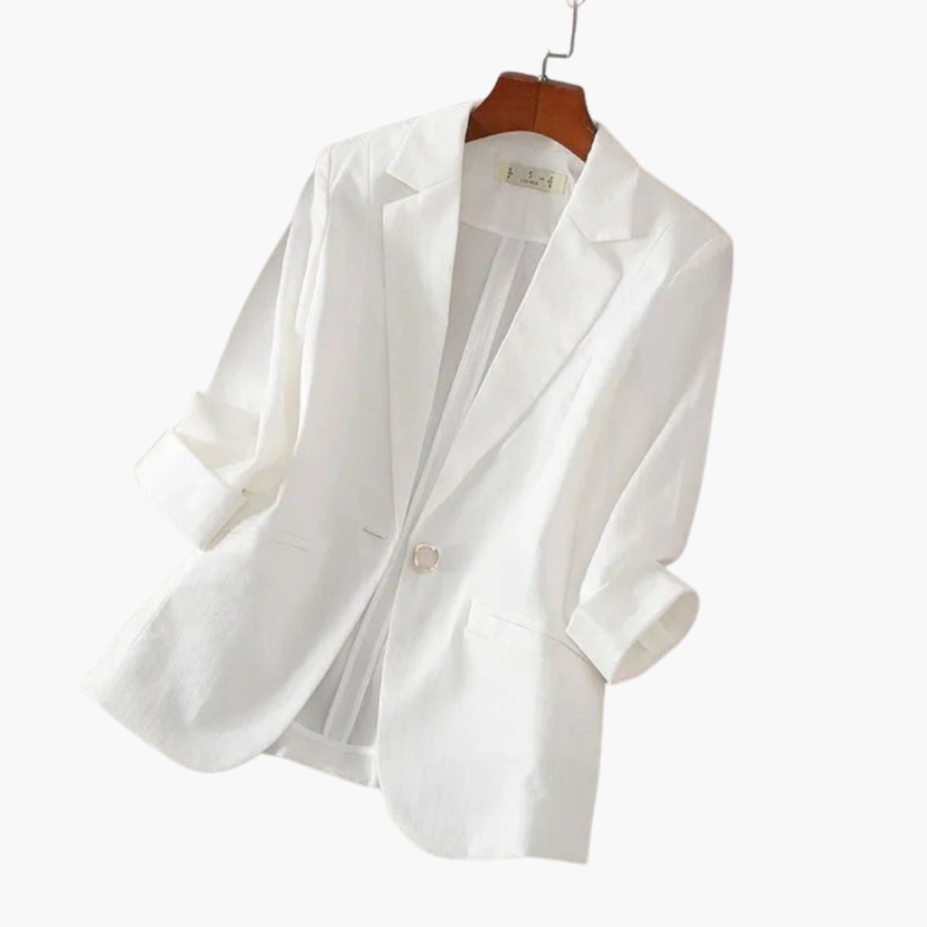 Rose pink women's blazer with 3/4 sleeves by Les Odettes, shown on a model, featuring tailored fit and stylish design.