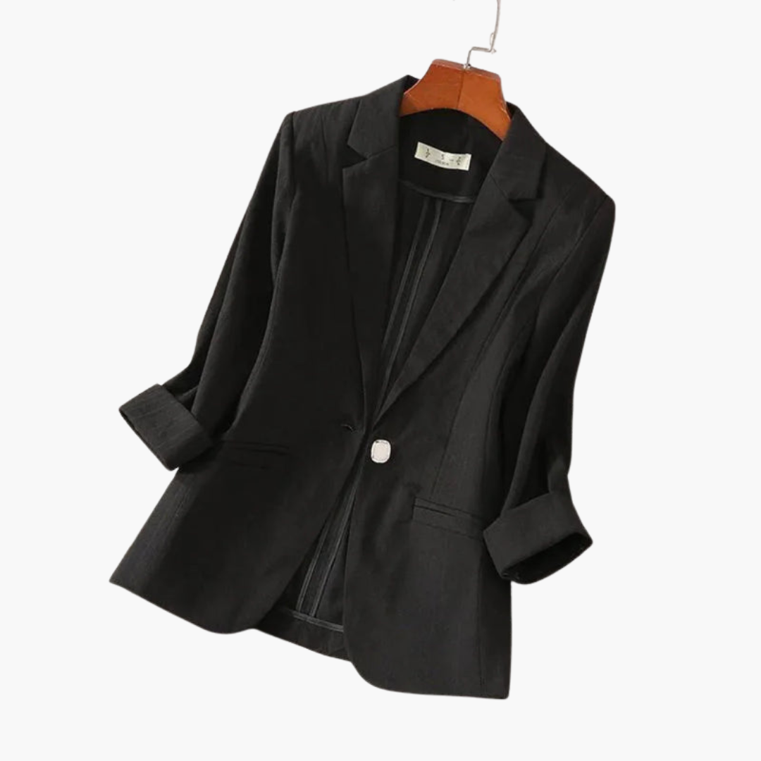 Pink women's 3/4 sleeve blazer by Les Odettes, featuring a tailored fit and stylish design, shown on a model.