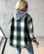 Checkered lined women's cardigan from Carmen™ by Les Odettes, featuring a cozy knit with button closure and front pockets.
