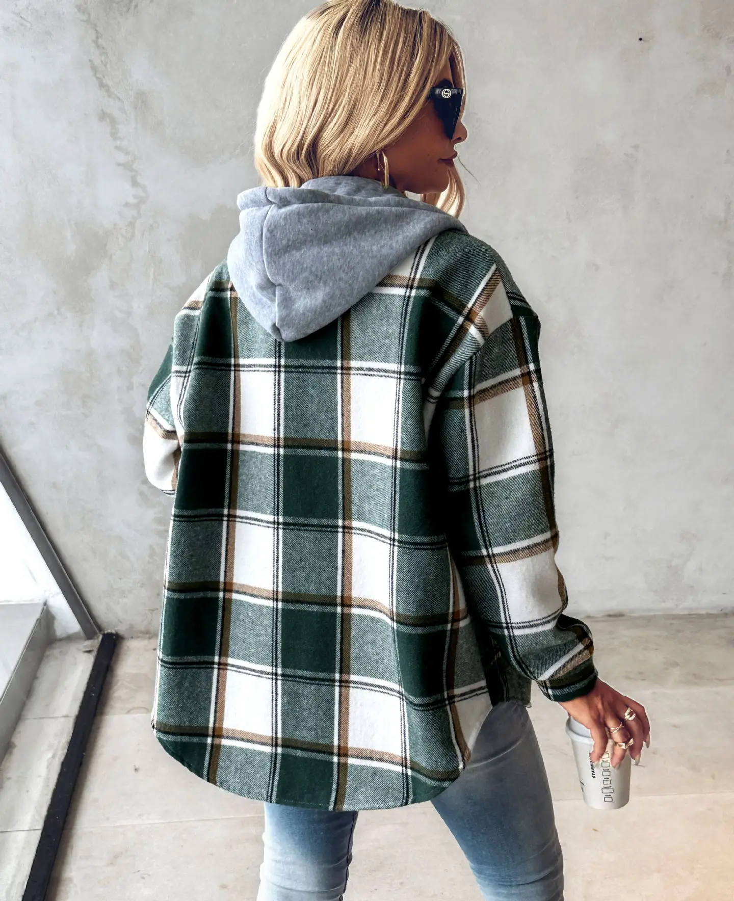 Checkered lined women's cardigan from Carmen™ by Les Odettes, featuring a cozy knit with button closure and front pockets.