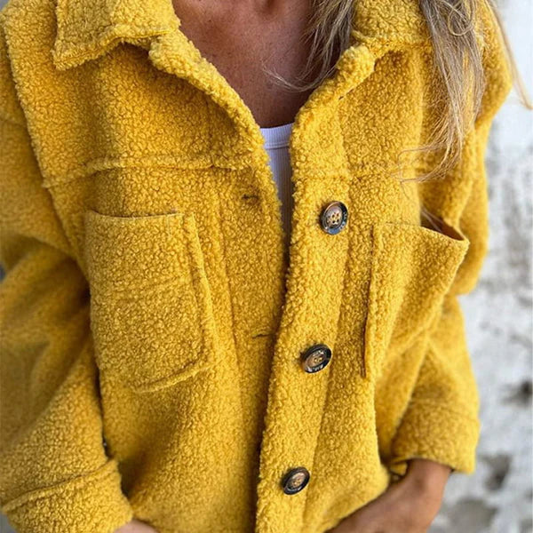 Les Odettes Marleau™ jacket with lapel collar, stylish coat featuring a classic lapel design and tailored fit.